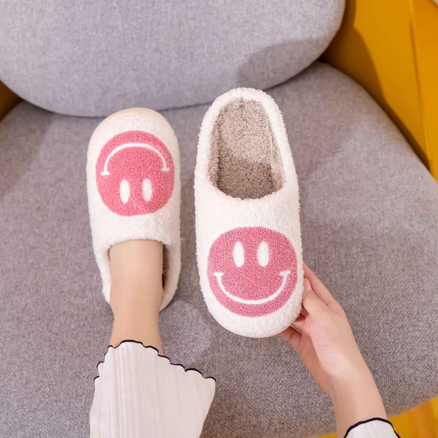 Pantuflas con cara sonriente Melody