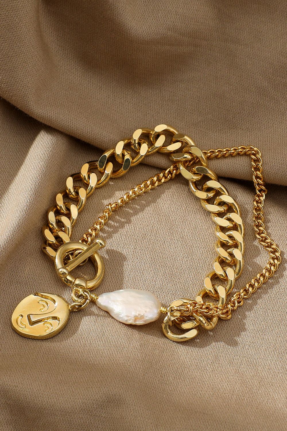 Goldkette und Perlenarmband 