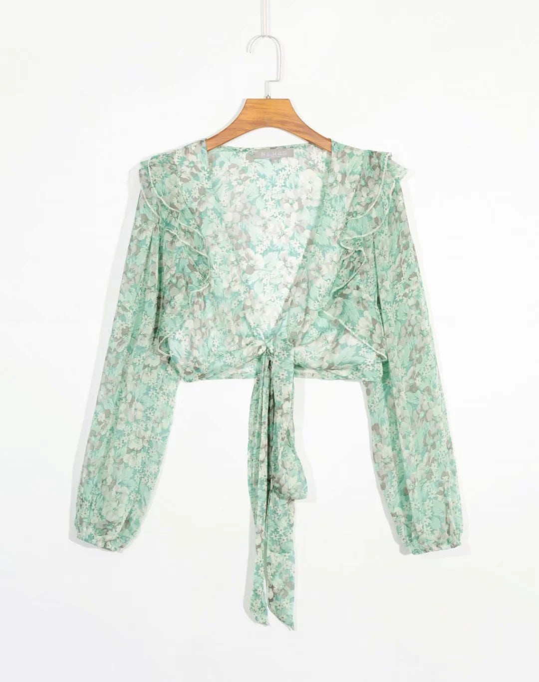 Floral print blouse with long sleeves and deep V-neck tie