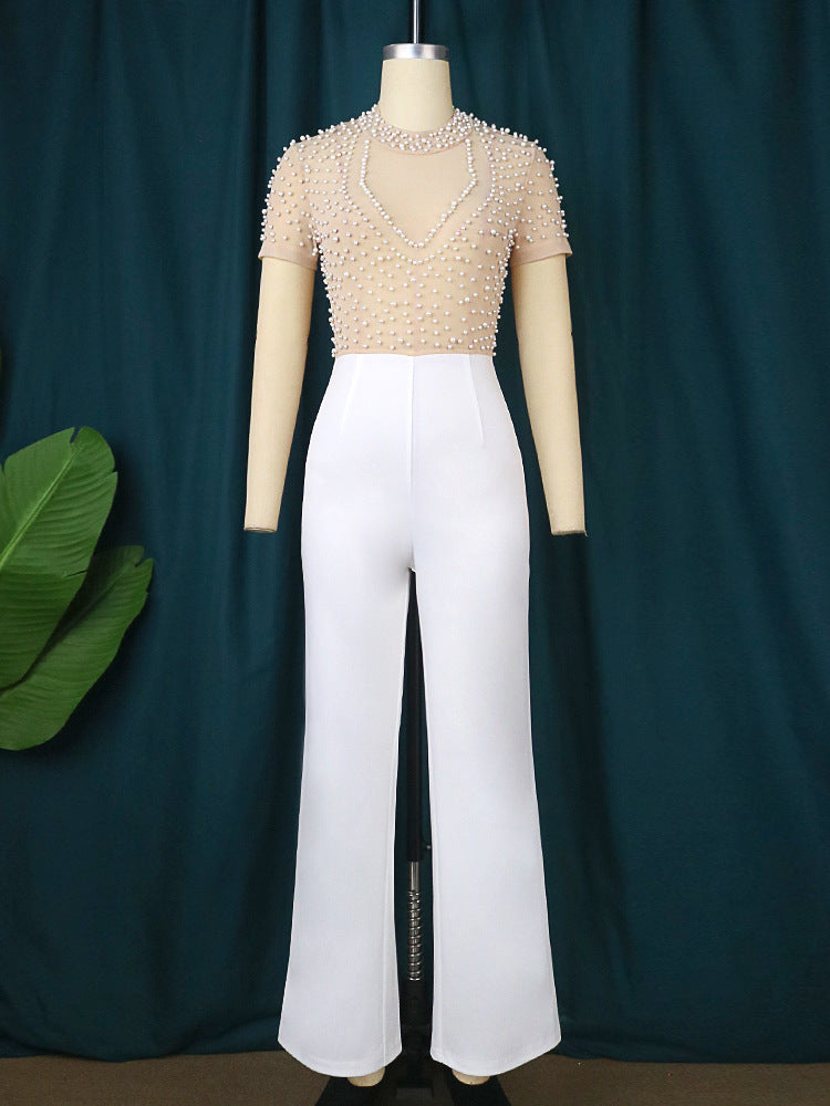 Lässiger, schmeichelhafter, kurzärmliger, perlenbesetzter Jumpsuit mit hoher Taille und Rundhalsausschnitt