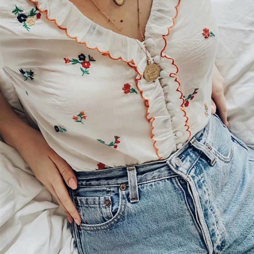 Embroidered ruffled shirt top