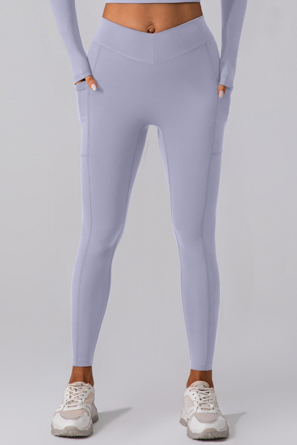 Aktive Leggings mit hoher Taille und Taschen