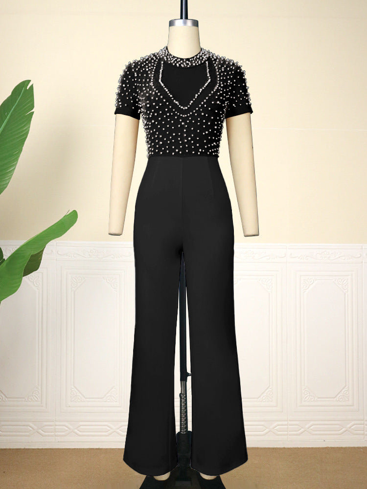 Lässiger, schmeichelhafter, kurzärmliger, perlenbesetzter Jumpsuit mit hoher Taille und Rundhalsausschnitt