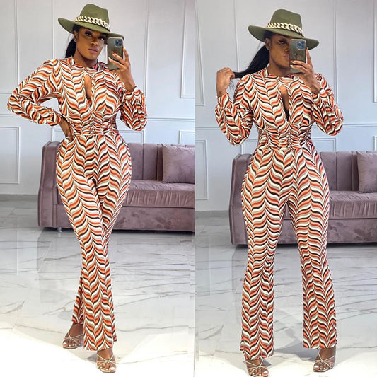 Cutout Nipped Waist Smocked Print Flared Jumpsuit