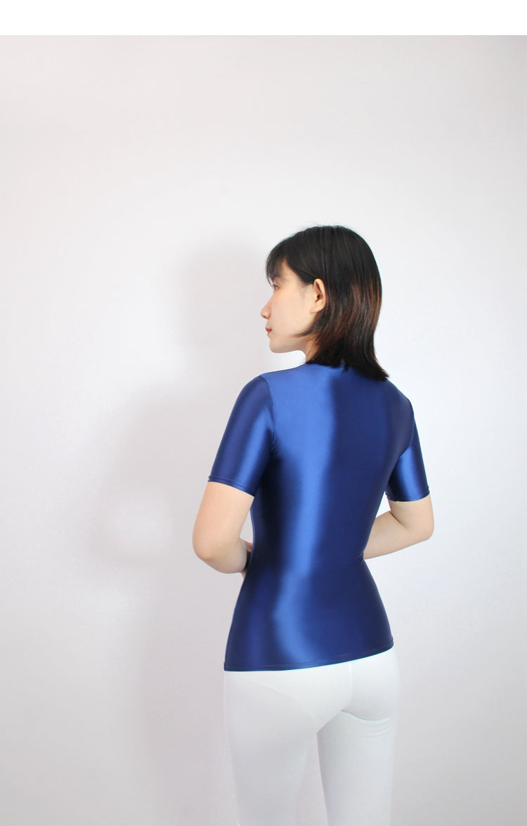 Camisa fina de spandex de manga corta con parte inferior elástica para mujer