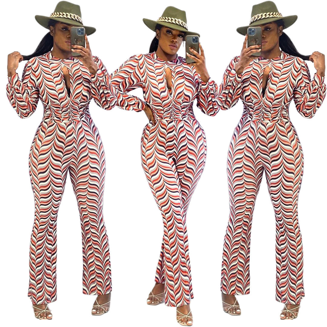 Ausgestellter Jumpsuit mit Cut-Out, gesmoktem Print und eingeschnürter Taille