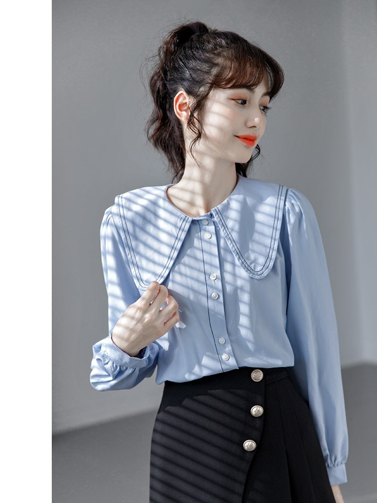 Camisa azul con cuello de muñeca, manga larga para mujer, sentido del diseño