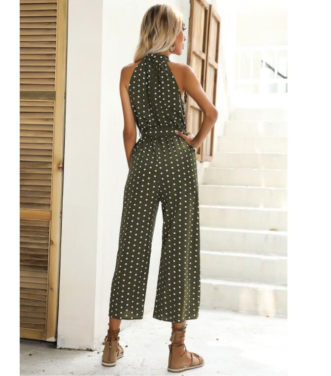 Sommerlicher Jumpsuit mit weitem Bein, Neckholder, Gürtel, gepunktetem Muster und Hosenträgern in Schwarz