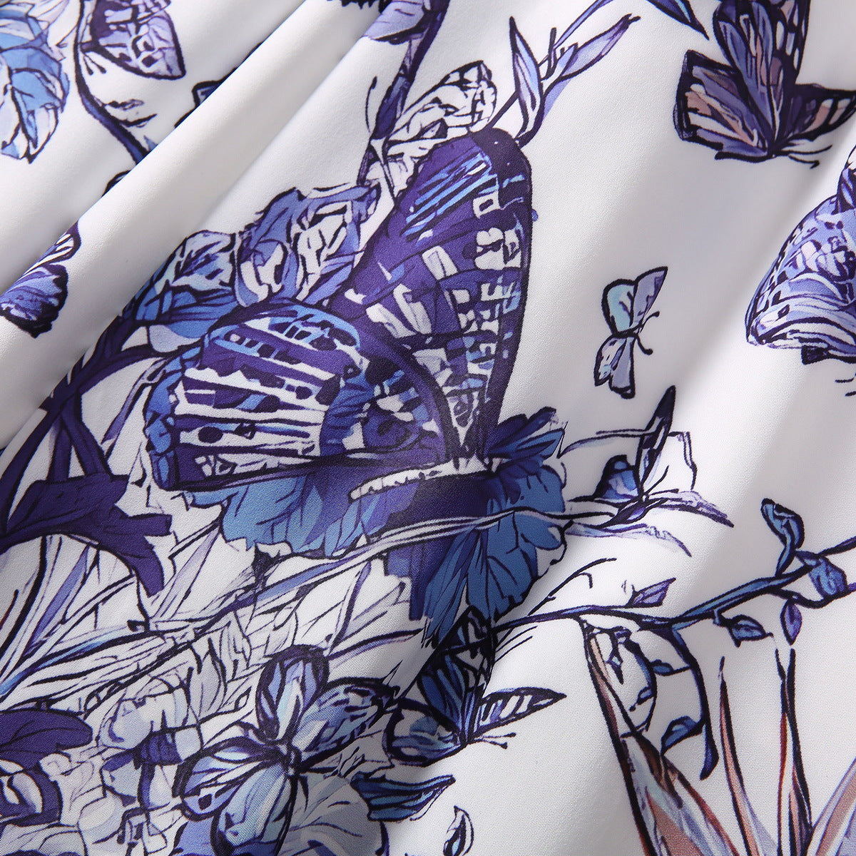 Kleid mit vierseitigem elastischem Blumen- und Schmetterlings-Print