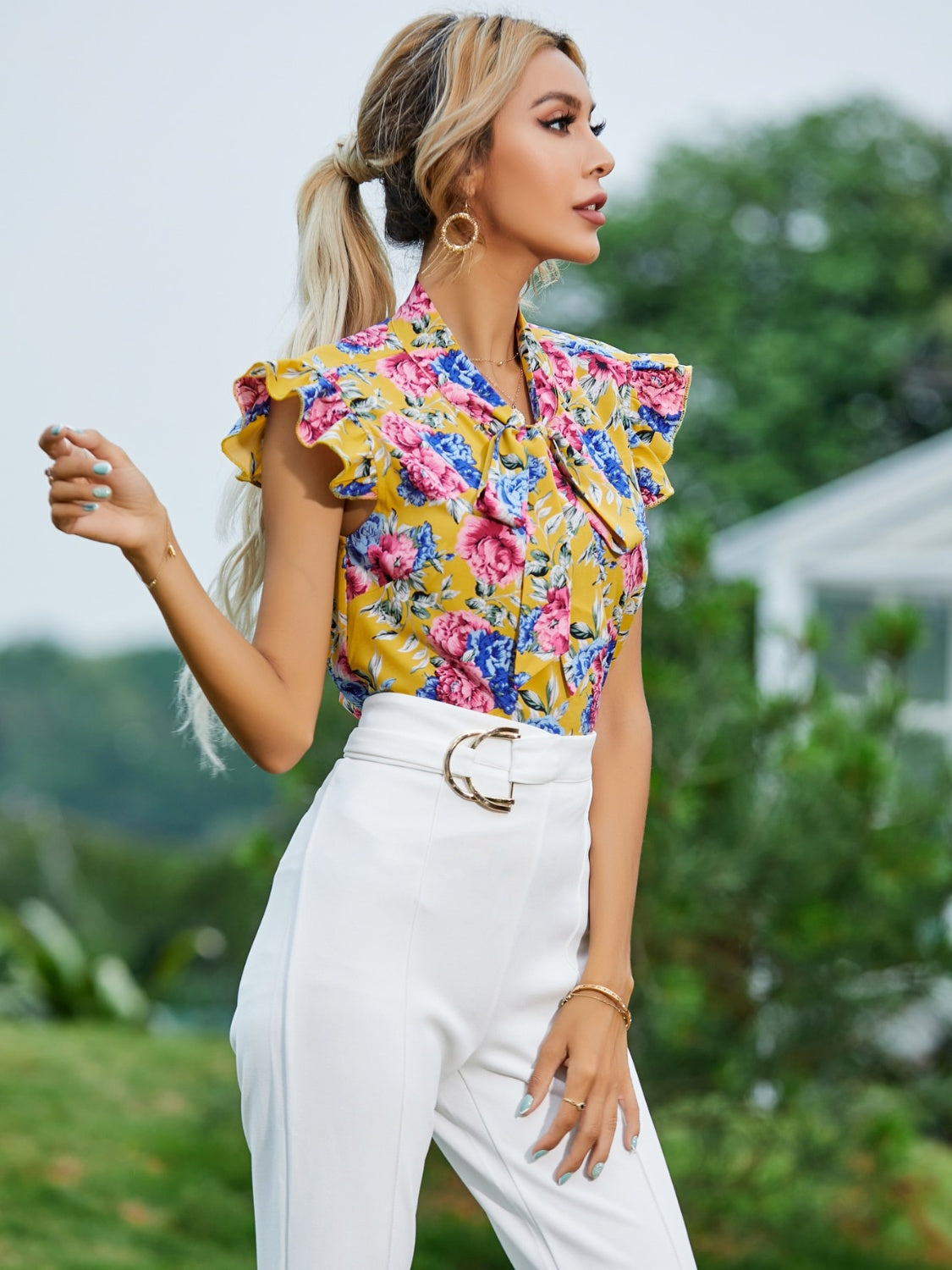 Ruffled Printed Tie Neck Cap Sleeve Blouse