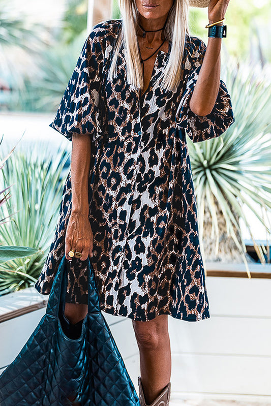 Vestido camisero con botones en la parte delantera y manga abullonada de leopardo negro