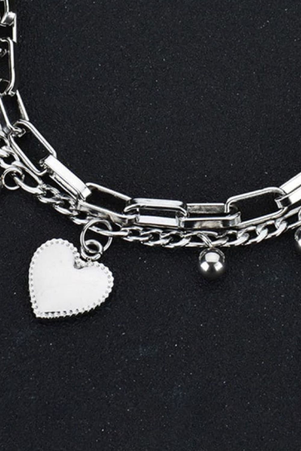 Pulsera de acero inoxidable con dije de corazón