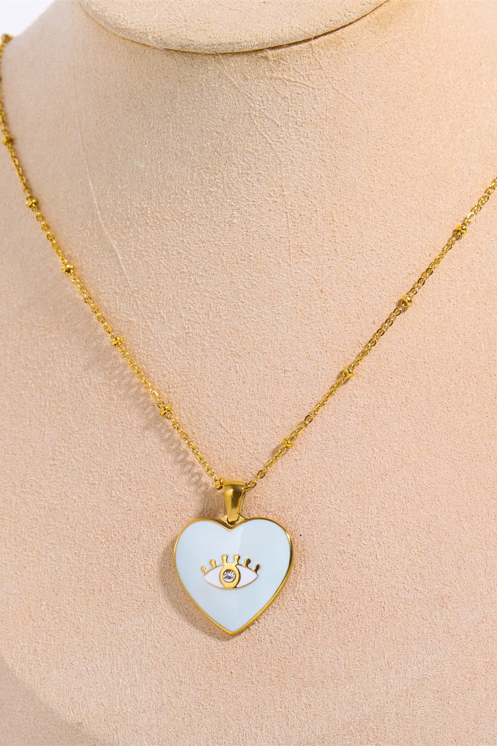 Collar con colgante chapado en oro de 18 quilates con forma de corazón y mal de ojo